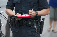Officer writing ticket